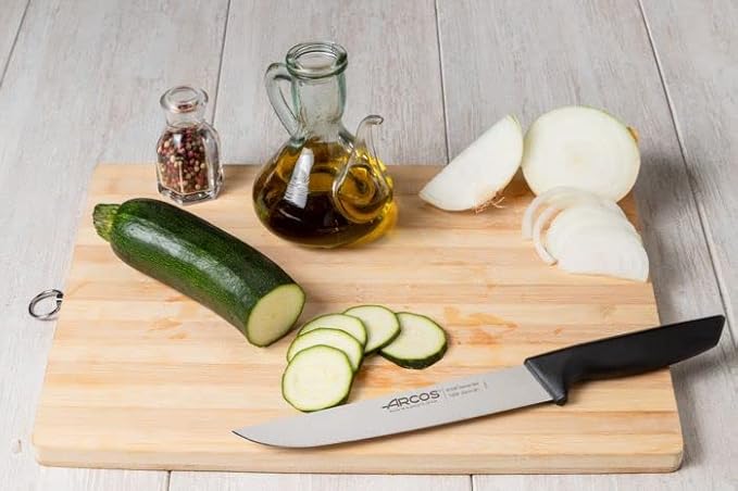 Arcos Kitchen Knife 8 Inch. Nitrum Stainless Steel Blade and Black Polypropylene Handle - Lightweight and Durable for Everyday Use. Niza Series