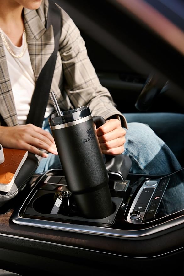 STANLEY Quencher H2.0 Tumbler with Handle and Straw 20 oz | Flowstate 3-Position Lid | Cup Holder Compatible for Travel | Insulated Stainless Steel Cup | BPA-Free | Peach Rose